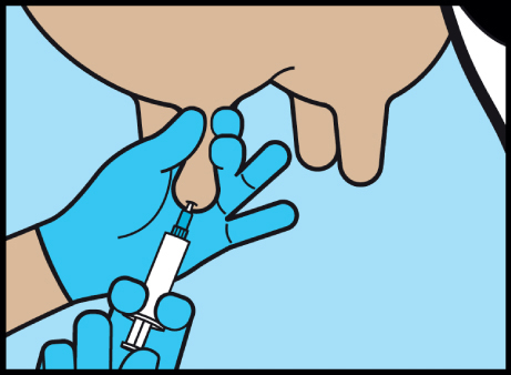 a close-up of a person's hand and syringe
